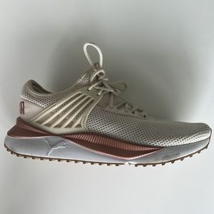 Puma runners with cream and rose gold accents with memory foam style pad.